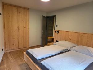 Una cama o camas en una habitación de Haus Amber