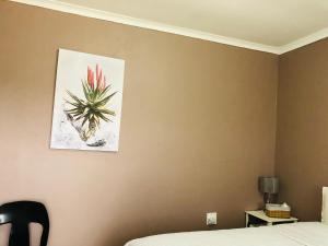 Ένα ή περισσότερα κρεβάτια σε δωμάτιο στο Bothoba Bed and Breakfast