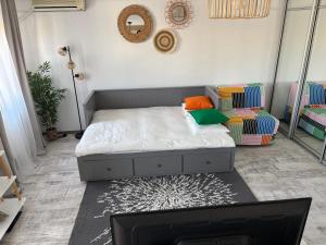 Postel nebo postele na pokoji v ubytování AMA Studio