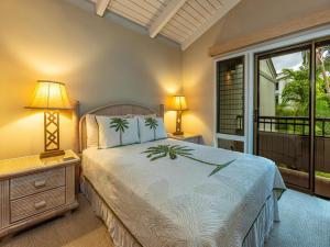 En eller flere senge i et værelse på Wailea Ekolu Village 910 + 27 billeder