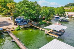 an aerial view of a dock on a river at Private Dock & Fireplace Steps from Osage Beach in Camdenton