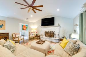 a living room with a couch and a fireplace at Walk to Lake Athens! Updated Home with Large Deck in Murchison