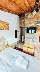 Postel nebo postele na pokoji v ubytování Nest Suite