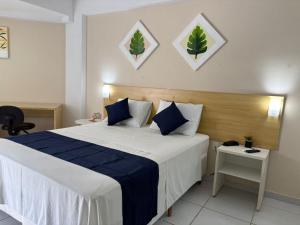 Ένα ή περισσότερα κρεβάτια σε δωμάτιο στο MoviHosts Marsallis +13 φωτογραφίες