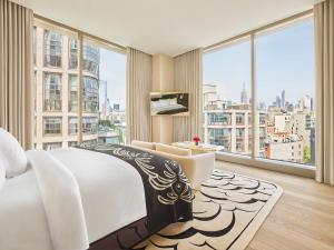 TV a/nebo společenská místnost v ubytování Faena New York