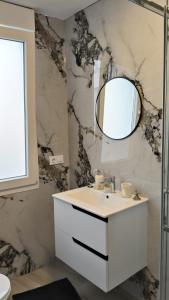 Koupelna v ubytování Piso Turístico Playa de Compostela