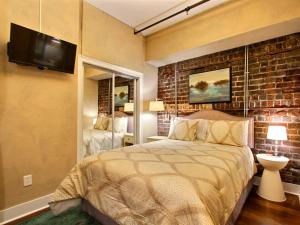 Postel nebo postele na pokoji v ubytování Soho Suite + 19 fotografií