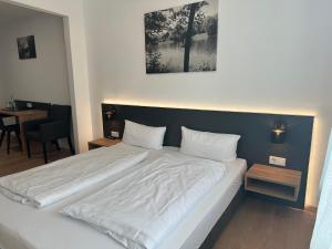 Postel nebo postele na pokoji v ubytování Gästehaus Maimühle - DZ-82 + 2 fotografie