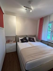 Ένα ή περισσότερα κρεβάτια σε δωμάτιο στο Allgäutraum