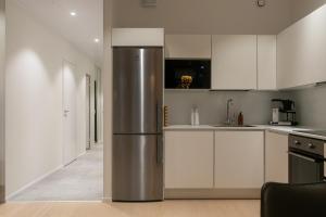 Η κουζίνα ή μικρή κουζίνα στο Vaaralan Valo +8 φωτογραφίες