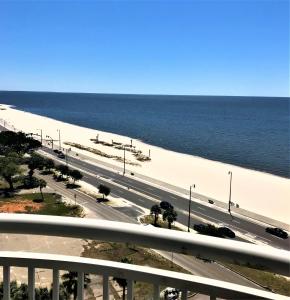 a highway next to a beach with the ocean at Spacious Beachview End Unit in Legacy Tower 1 -1001 - 3 bedroom 3 bath condo in De Buys