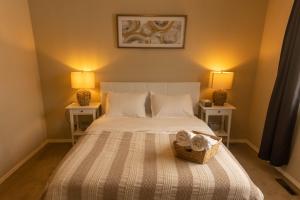 a bedroom with a bed with a basket on it at Mi Light House 米拉 in Yellowknife