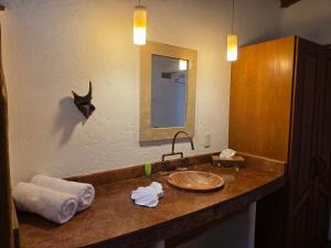 Koupelna v ubytování Cabañas el Nido de la Huilota + 122 fotografií