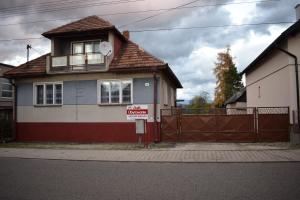 a house with a no parking sign in front of it at DáMa in Ružomberok