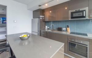 Kuchyň nebo kuchyňský kout v ubytování Corporate Stays Slater 1 Bedroom