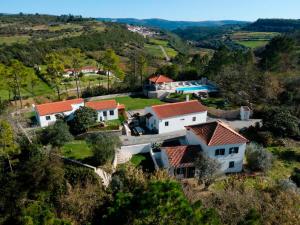 an aerial view of a house on a hill at Mountain View 2 Bedroom Chalet in Alcobaça