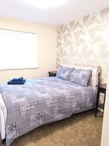 En eller flere senge i et værelse på Cozy Corner For You