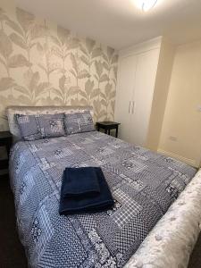 En eller flere senge i et værelse på Cozy Corner For You