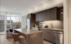 Køkken eller tekøkken på Corporate Stays The Wedge 1 Bedroom