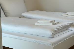 Ένα ή περισσότερα κρεβάτια σε δωμάτιο στο Danube Suites +22 φωτογραφίες