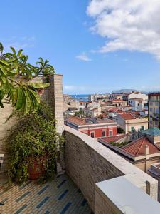 una vista de una ciudad desde un balcón en B&B AL PASSIO, en Palermo