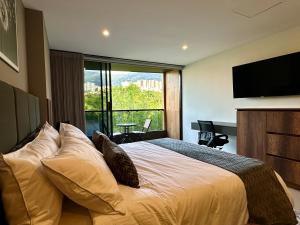 Ένα ή περισσότερα κρεβάτια σε δωμάτιο στο Rooca Urban