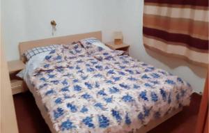 Postel nebo postele na pokoji v ubytování 2 Bedroom Amazing Apartment In Mrkopalj