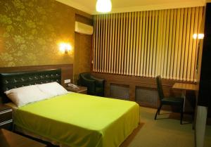 Postel nebo postele na pokoji v ubytování Hopa Heyamo Hotel