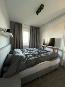 Ένα ή περισσότερα κρεβάτια σε δωμάτιο στο Groningen Centrum gratis parkeren