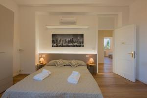 Ένα ή περισσότερα κρεβάτια σε δωμάτιο στο Camera Tokyo - La Casa di Carta Affittacamere