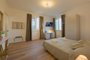 Ένα ή περισσότερα κρεβάτια σε δωμάτιο στο Camera Tokyo - La Casa di Carta Affittacamere