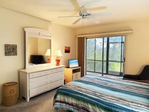 Postel nebo postele na pokoji v ubytování Coastal Comfort – 2BR Condo in Fiddlers Green + 17 fotografií