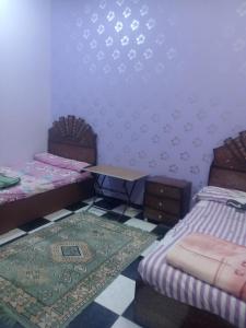 Postel nebo postele na pokoji v ubytování house alekhlel