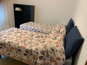 Postel nebo postele na pokoji v ubytování Casa Vacanze Via Giulia