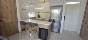 Kuchyň nebo kuchyňský kout v ubytování Maravilloso Apartamento Ricaurte