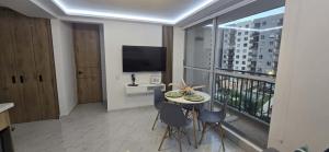 TV a/nebo společenská místnost v ubytování Maravilloso Apartamento Ricaurte