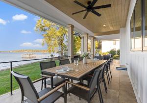 a dining room with a table and chairs on a patio at Circle Hollow in Denver