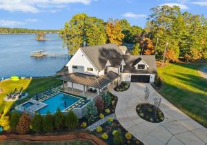 an aerial view of a house with a swimming pool at Circle Hollow in Denver
