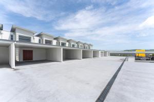 an empty parking lot in front of a building at Stay Central Taupo in Taupo