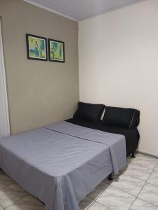 Katil atau katil-katil dalam bilik di Quarto Nordeste Aracaju