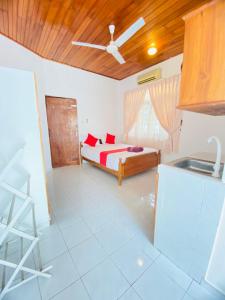 Ένα ή περισσότερα κρεβάτια σε δωμάτιο στο The Kingsway Guesthouse