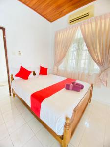 Ένα ή περισσότερα κρεβάτια σε δωμάτιο στο The Kingsway Guesthouse