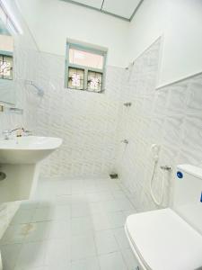 Ένα μπάνιο στο The Kingsway Guesthouse +1 φωτογραφίες