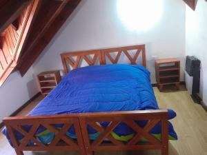 Ένα ή περισσότερα κρεβάτια σε δωμάτιο στο Departamento 2