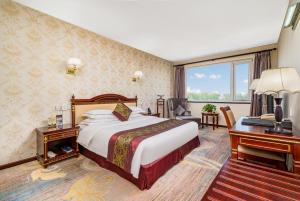 Postel nebo postele na pokoji v ubytování Beijing Commercial Business Hotel + 73 fotografií