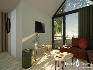 TV a/nebo společenská místnost v ubytování Cozy 6-person lodge by the fishing pond