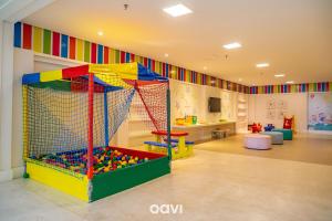 a room with a play room with a ball pit at In Mare Bali Resort Beira Mar by Qavi - 57 in Parnamirim