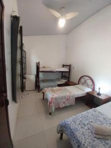 Ένα ή περισσότερα κρεβάτια σε δωμάτιο στο Verde Mar Inn