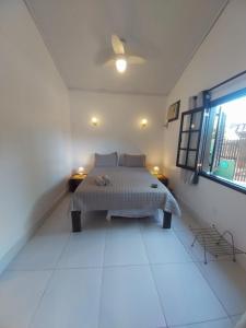 Ένα ή περισσότερα κρεβάτια σε δωμάτιο στο Verde Mar Inn