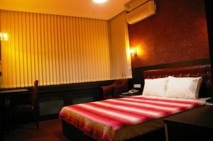 Postel nebo postele na pokoji v ubytování Hopa Heyamo Hotel